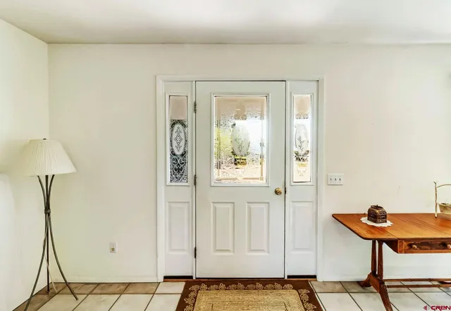 a very nice looking room with a dining table