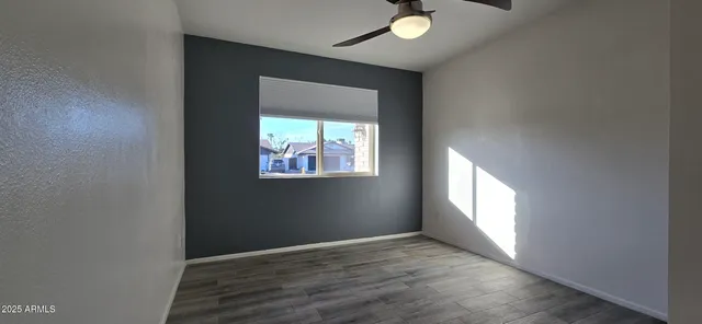 an empty room that has a window