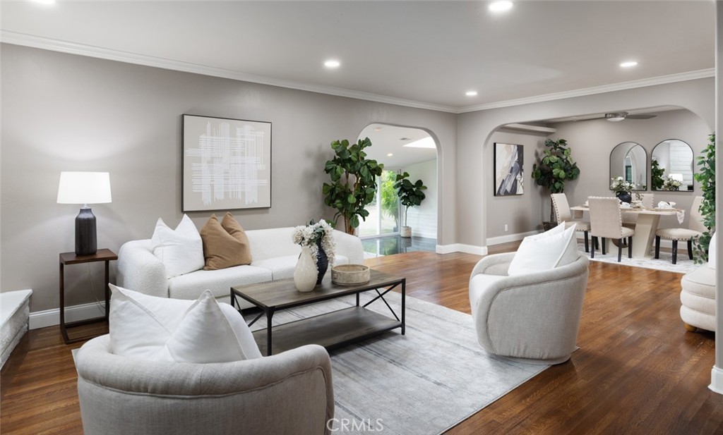 14191 Lambeth Way Tustin, CA 92780 - Photo 11 of 34 a living room with furniture and a wooden floor