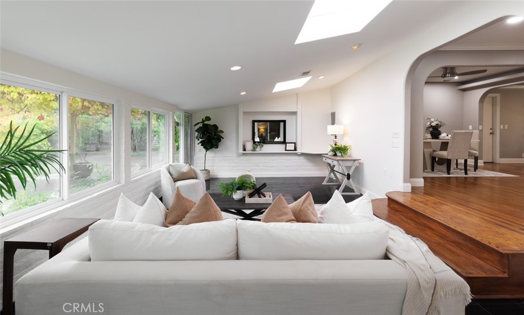 14191 Lambeth Way Tustin, CA 92780 - Photo 12 of 34 a living room with furniture and a large window