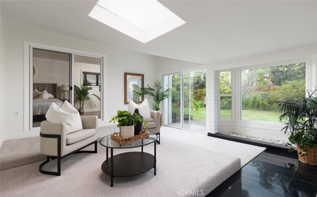 14191 Lambeth Way Tustin, CA 92780 - Photo 13 of 34 a living room with furniture and a large window