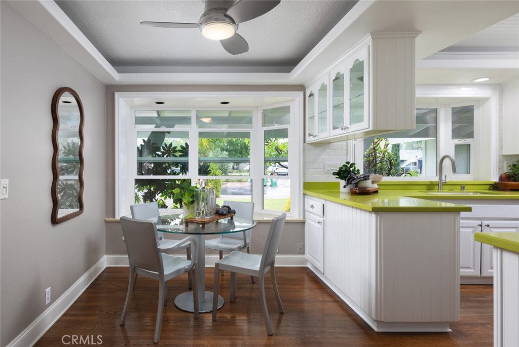 14191 Lambeth Way Tustin, CA 92780 - Photo 18 of 34 a dining room with furniture and a window