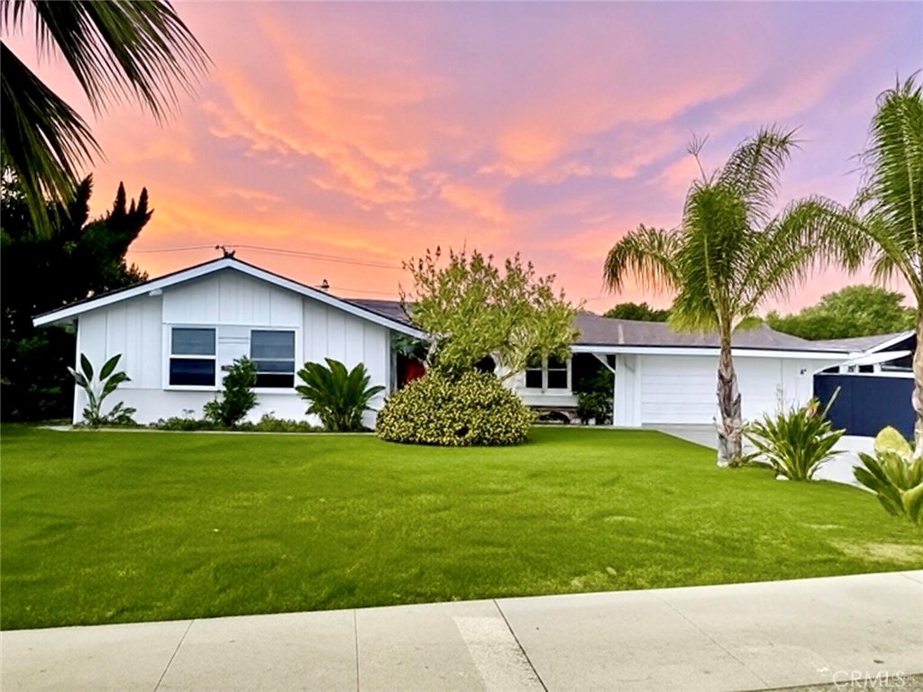 14191 Lambeth Way Tustin, CA 92780 - Photo 2 of 34 a front view of house with yard and green space