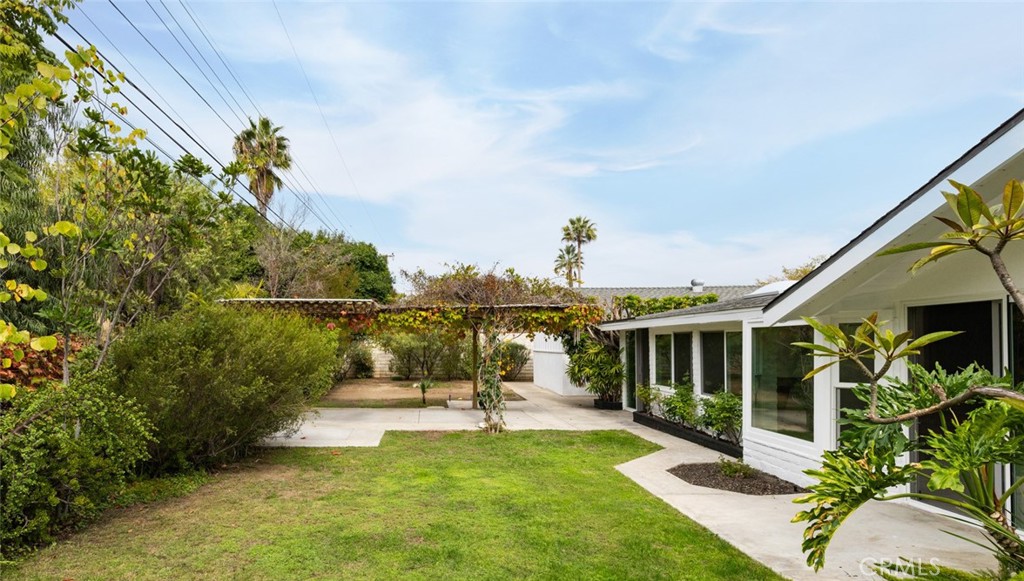14191 Lambeth Way Tustin, CA 92780 - Photo 34 of 34 a view of a house with backyard porch and sitting area