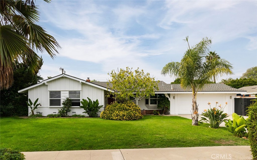 14191 Lambeth Way Tustin, CA 92780 - Photo 4 of 34 a view of a yard in front of house