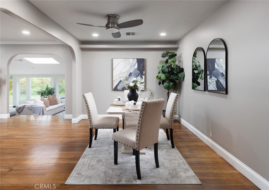 14191 Lambeth Way Tustin, CA 92780 - Photo 6 of 34 a view of a dining room with furniture window and wooden floor