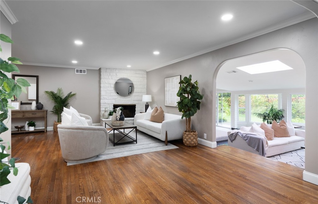 14191 Lambeth Way Tustin, CA 92780 - Photo 7 of 34 a living room with furniture and a large window