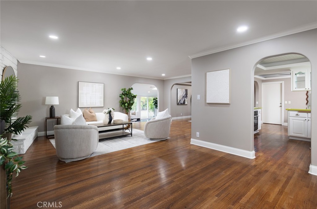14191 Lambeth Way Tustin, CA 92780 - Photo 8 of 34 a living room with furniture and a wooden floor