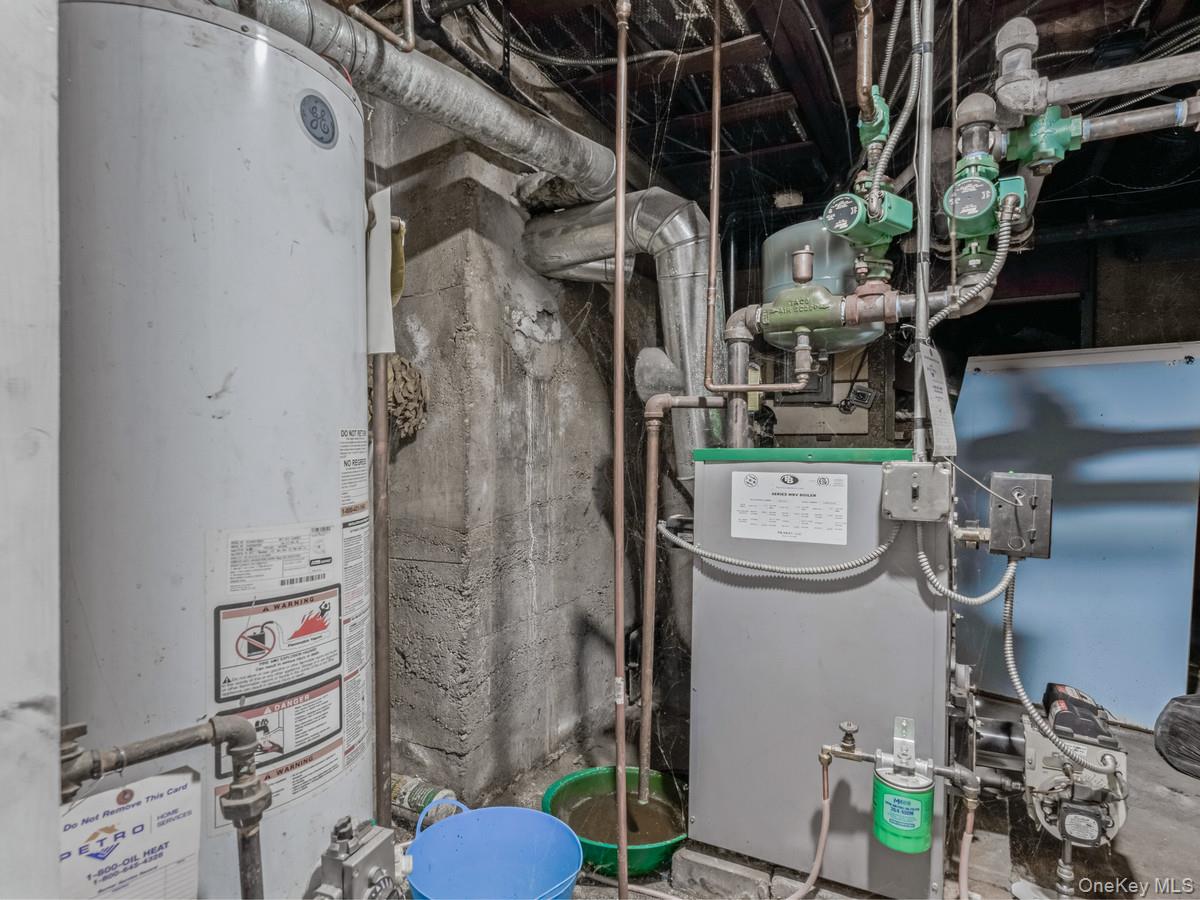 27-21 Coldspring Road Queens, NY 11691 - Photo 22 of 27 a close view of water heater room