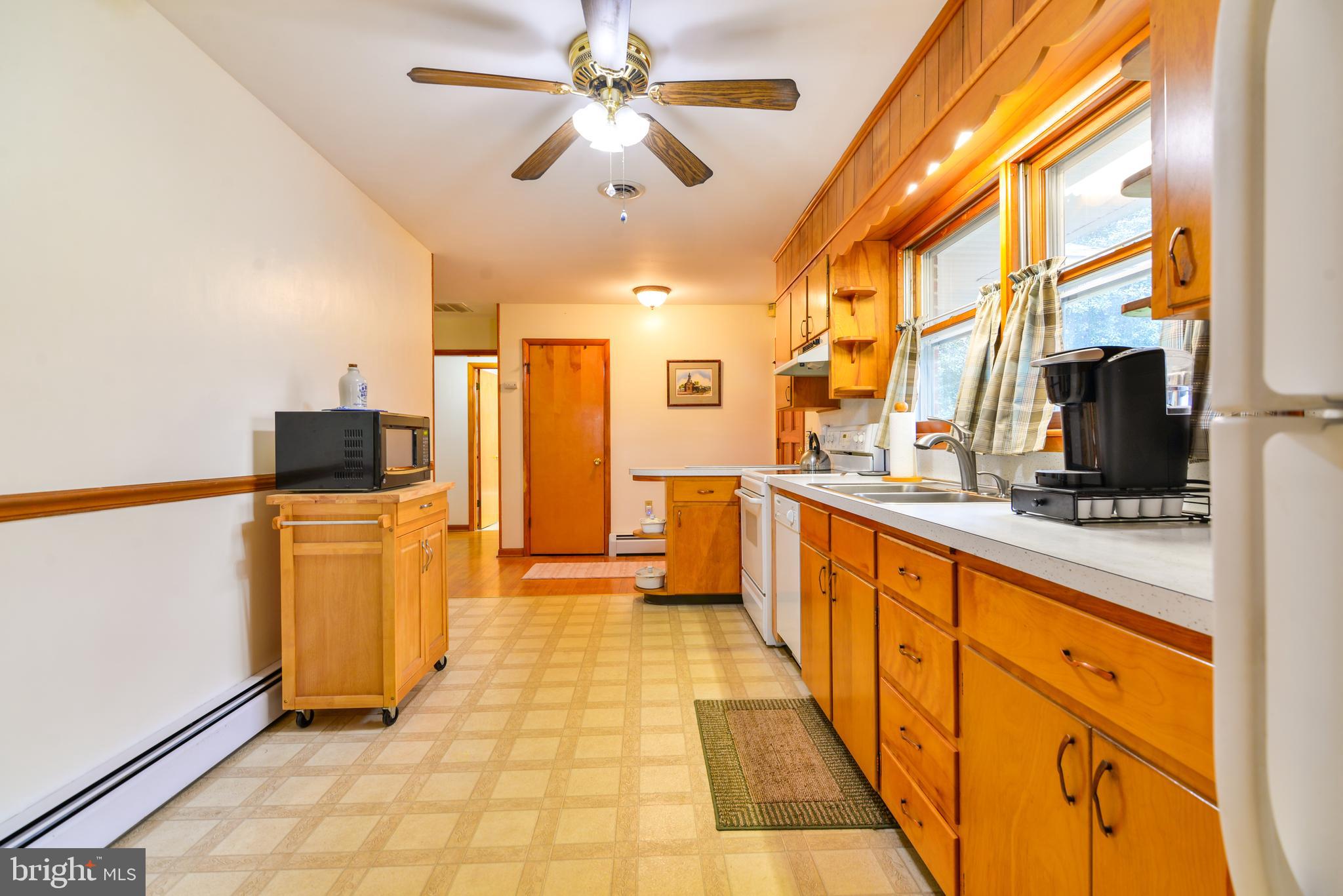 6914 North Clifton Road Frederick, MD 21702 - Photo 14 of 50 Ceiling fan in kitchen