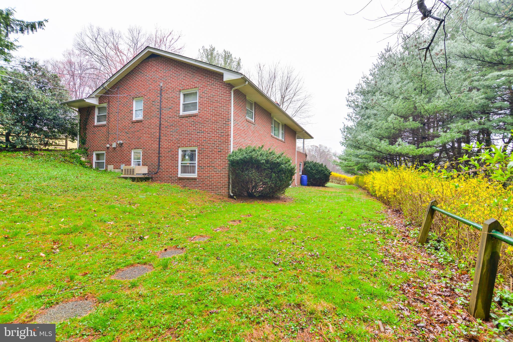 6914 North Clifton Road Frederick, MD 21702 - Photo 46 of 50 Stone path leads to second outbuilding