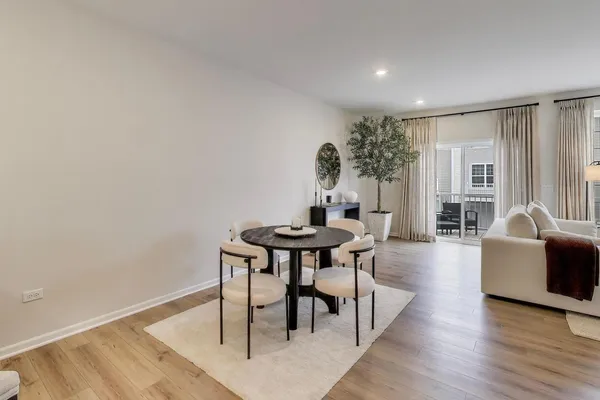 a view of a livingroom with furniture and wooden floor