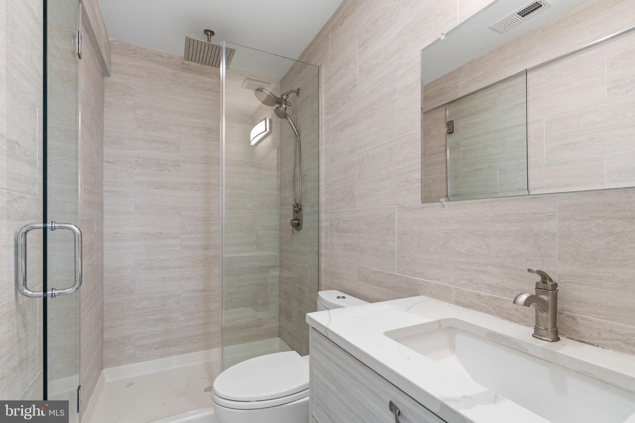 1944 Morrell Street Philadelphia, PA 19115 - Photo 24 of 44 a bathroom with a sink toilet and shower