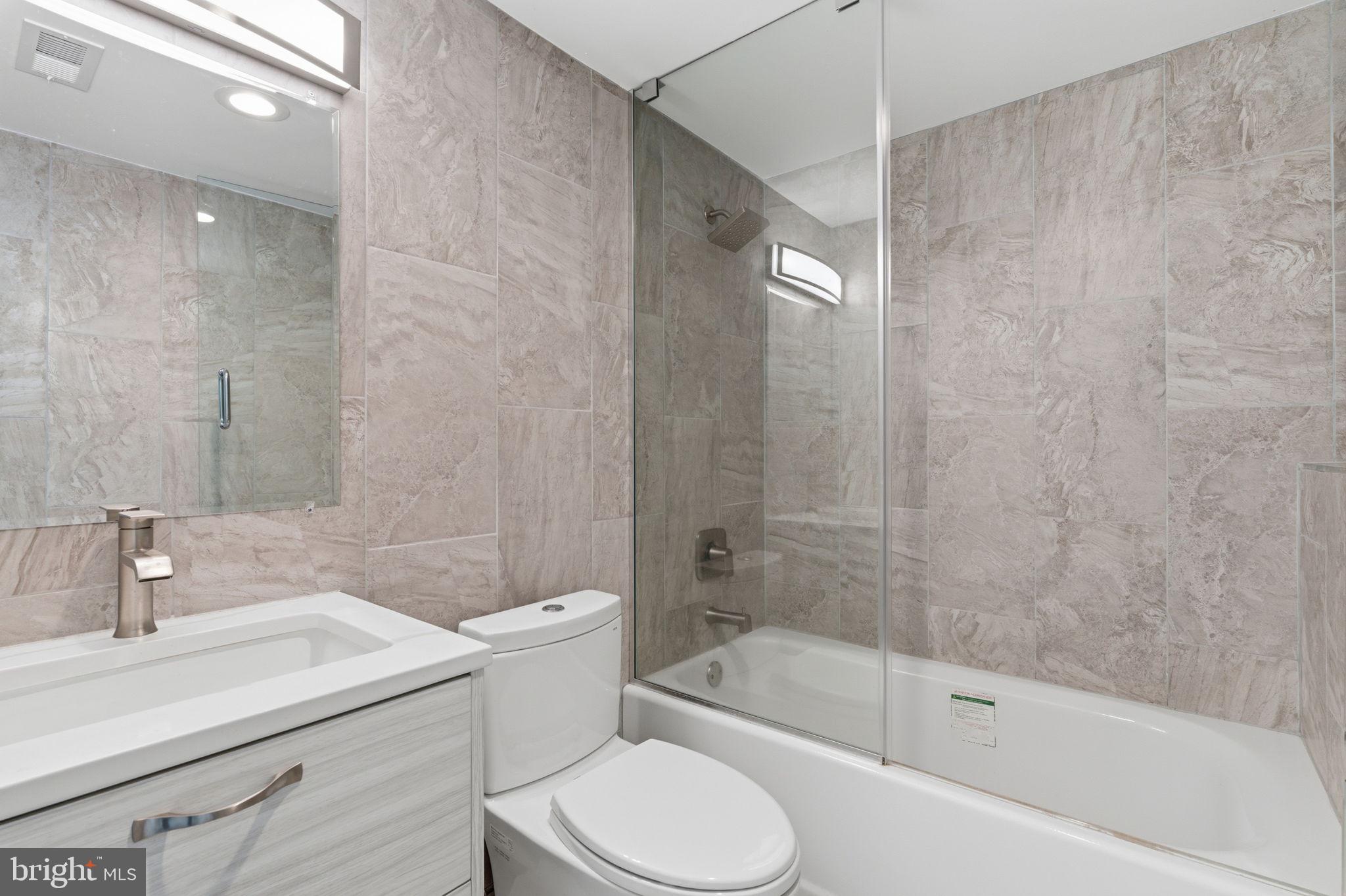 1944 Morrell Street Philadelphia, PA 19115 - Photo 36 of 44 a bathroom with a sink a toilet and shower