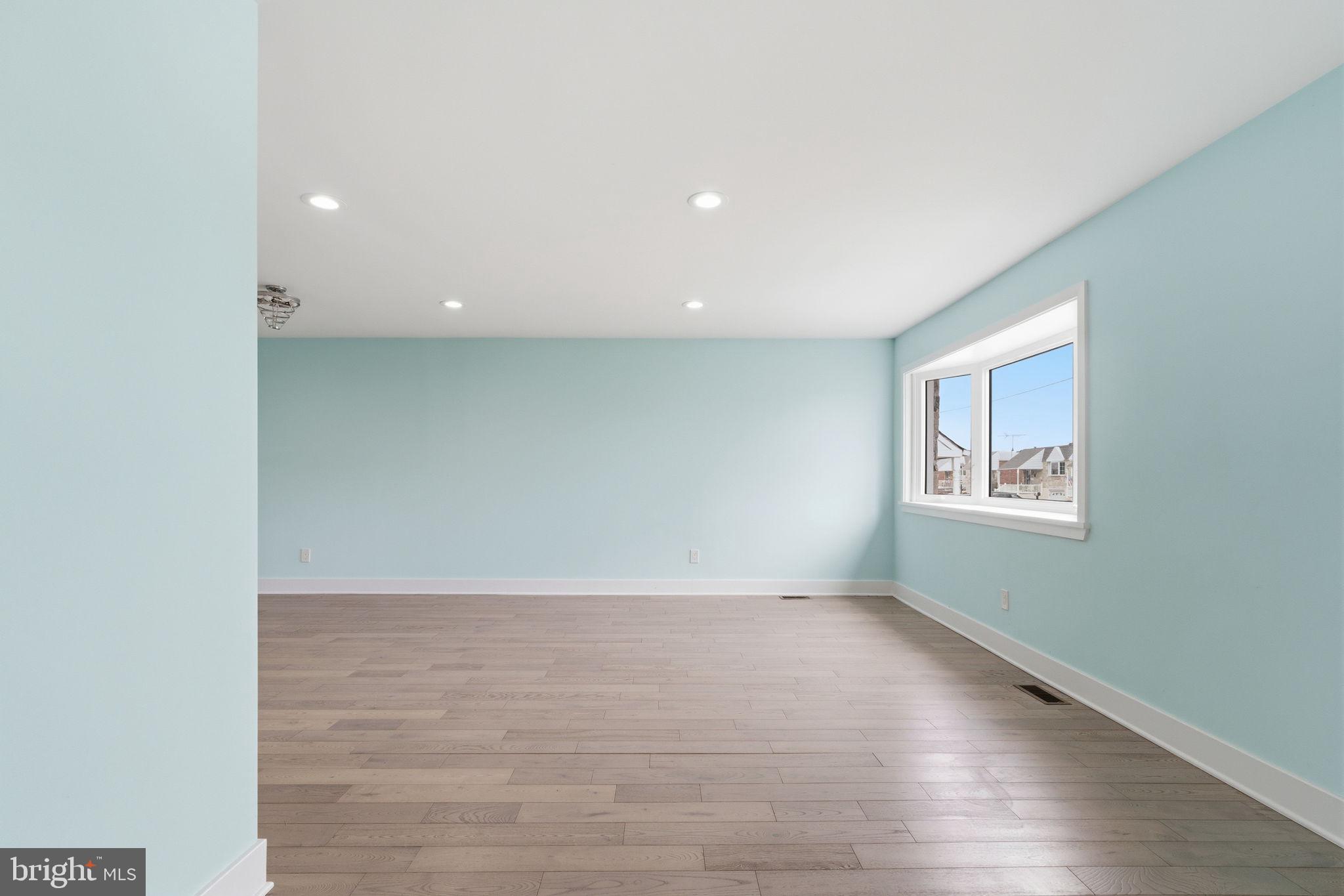 1944 Morrell Street Philadelphia, PA 19115 - Photo 4 of 44 a view of an empty room with a window