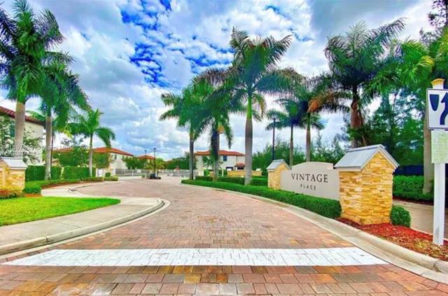 a view of a park with palm trees