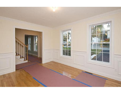 183 Florence Road Waltham, MA 02453 - Photo 8 of 18 an empty room with wooden floor and windows