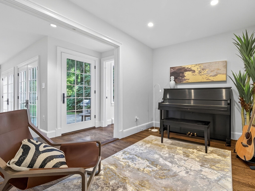 19 Marvin Road Wellesley, MA 02482 - Photo 14 of 33 a living room with furniture a window and a flat screen tv