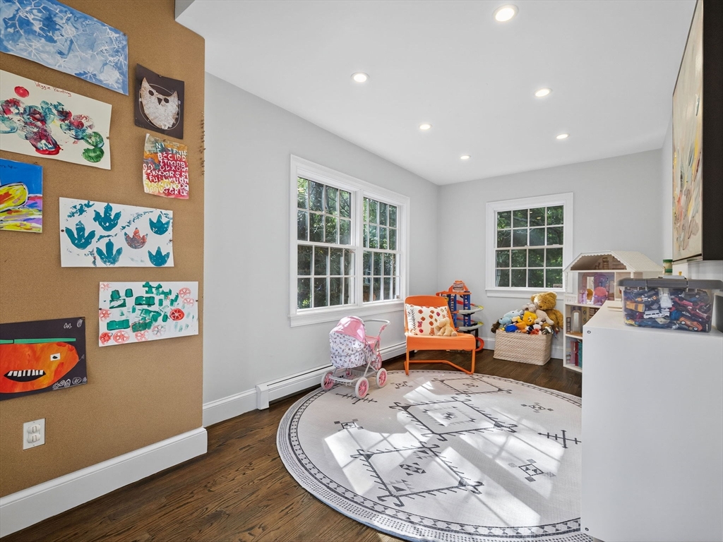 19 Marvin Road Wellesley, MA 02482 - Photo 15 of 33 a living room with furniture and a wooden floor