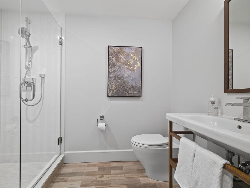 19 Marvin Road Wellesley, MA 02482 - Photo 16 of 33 a bathroom with a toilet sink and shower