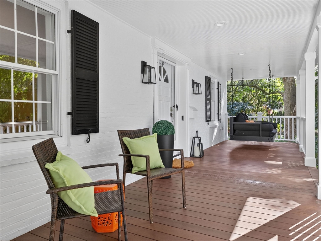 19 Marvin Road Wellesley, MA 02482 - Photo 2 of 33 a view of a livingroom with furniture and a yard
