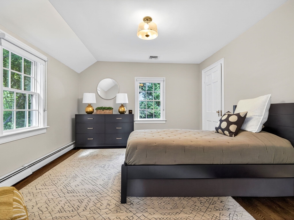 19 Marvin Road Wellesley, MA 02482 - Photo 24 of 33 a bedroom with a bed and a window