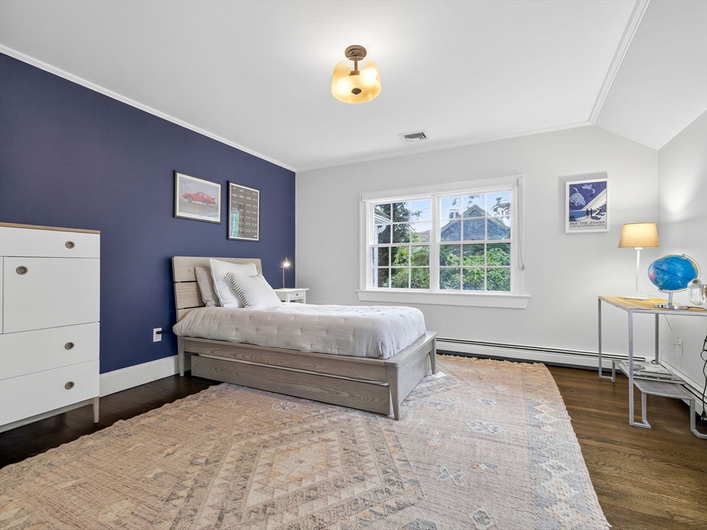 19 Marvin Road Wellesley, MA 02482 - Photo 25 of 33 a spacious bedroom with a bed and window