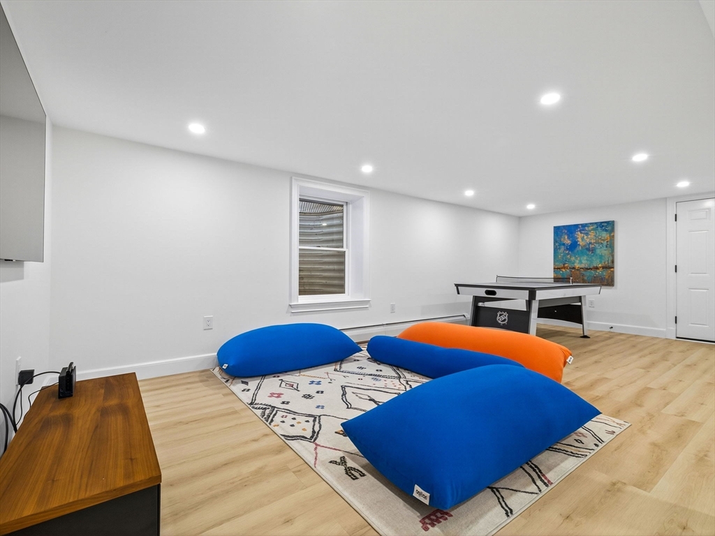 19 Marvin Road Wellesley, MA 02482 - Photo 26 of 33 a bedroom with furniture and a large window