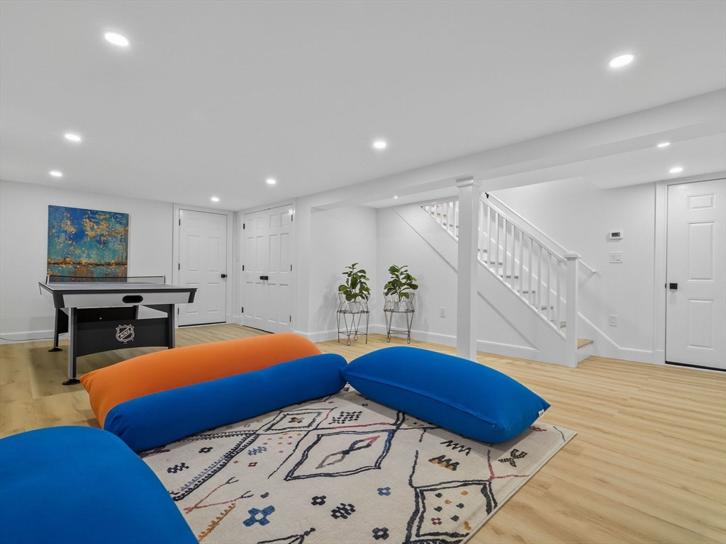 19 Marvin Road Wellesley, MA 02482 - Photo 27 of 33 a view of a room with furniture and wooden floor