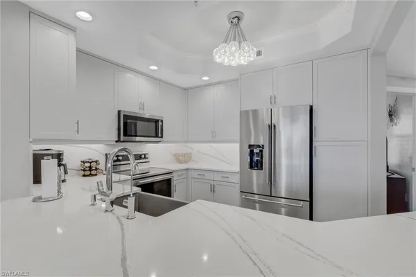 $4,950 | 420 Cove Tower Drive, Unit 802, Naples, FL 34110