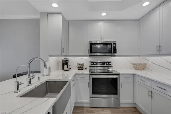 $4,950 | 420 Cove Tower Drive, Unit 802, Naples, FL 34110