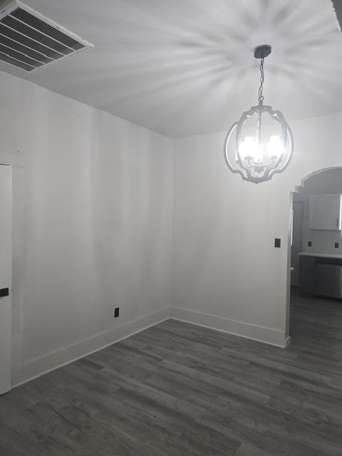 608 East Pecan Street Taylor, TX 76574 - Photo 16 of 25 a view of a room with wooden floor and white walls