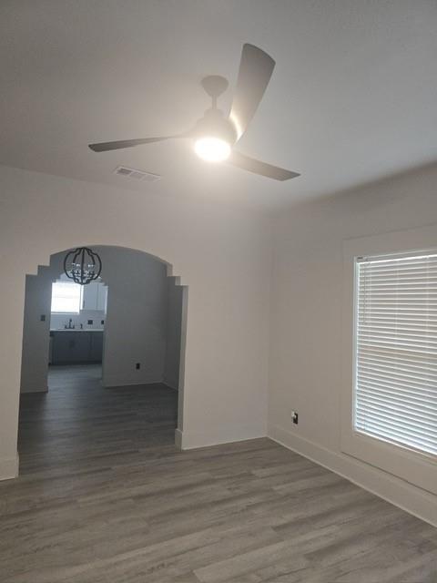 608 East Pecan Street Taylor, TX 76574 - Photo 9 of 25 a view of empty room with wooden floor