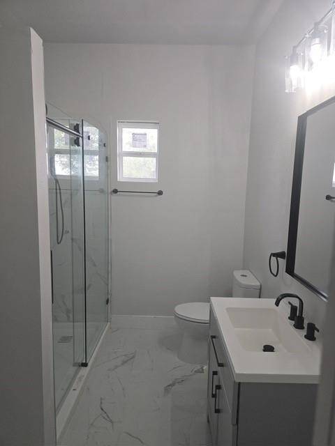 608 East Pecan Street Taylor, TX 76574 - Photo 10 of 25 a bathroom with a sink toilet and shower