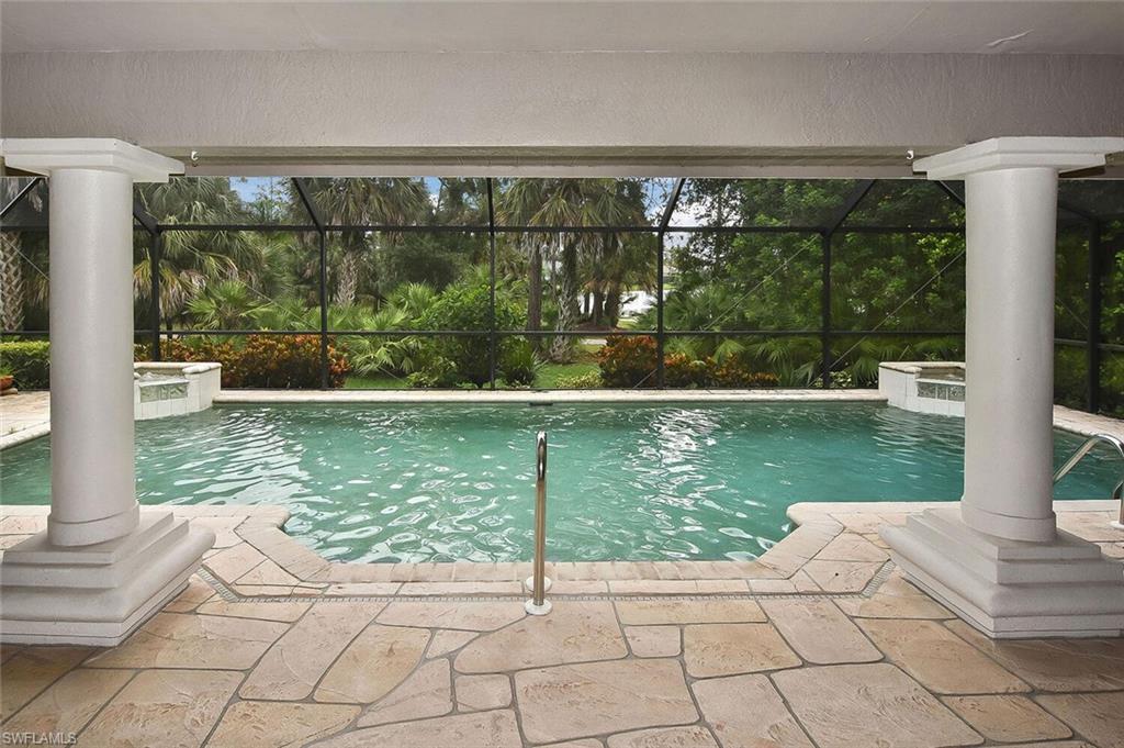 8928 Lely Island Circle Naples, FL 34113 - Photo 38 of 44 a view of swimming pool from window