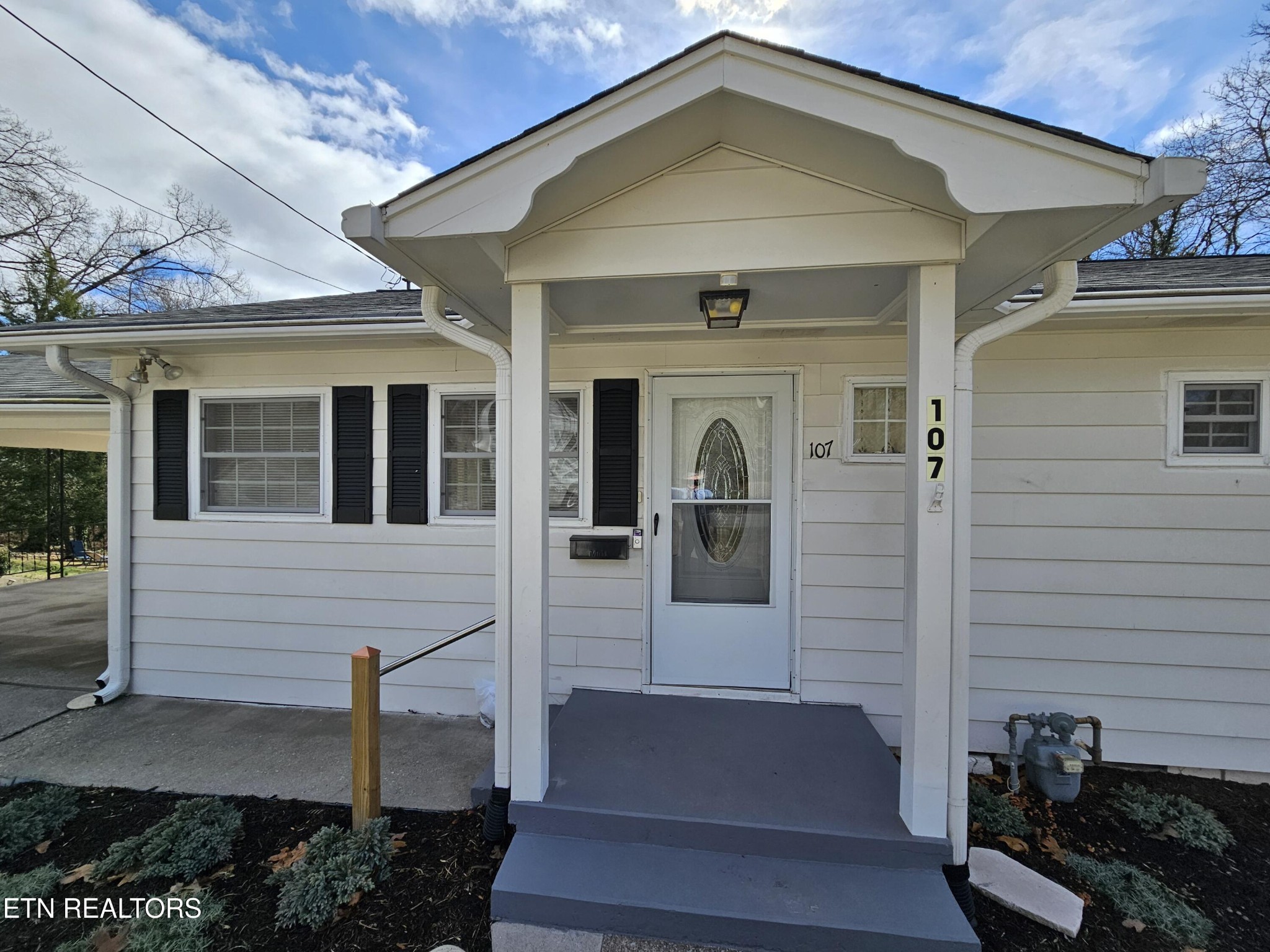 107 Norton Road Oak Ridge, TN 37830 - Photo 3 of 46 a front view of a house with a yard