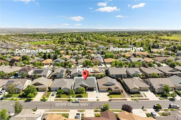 an aerial view of residential building and ocean