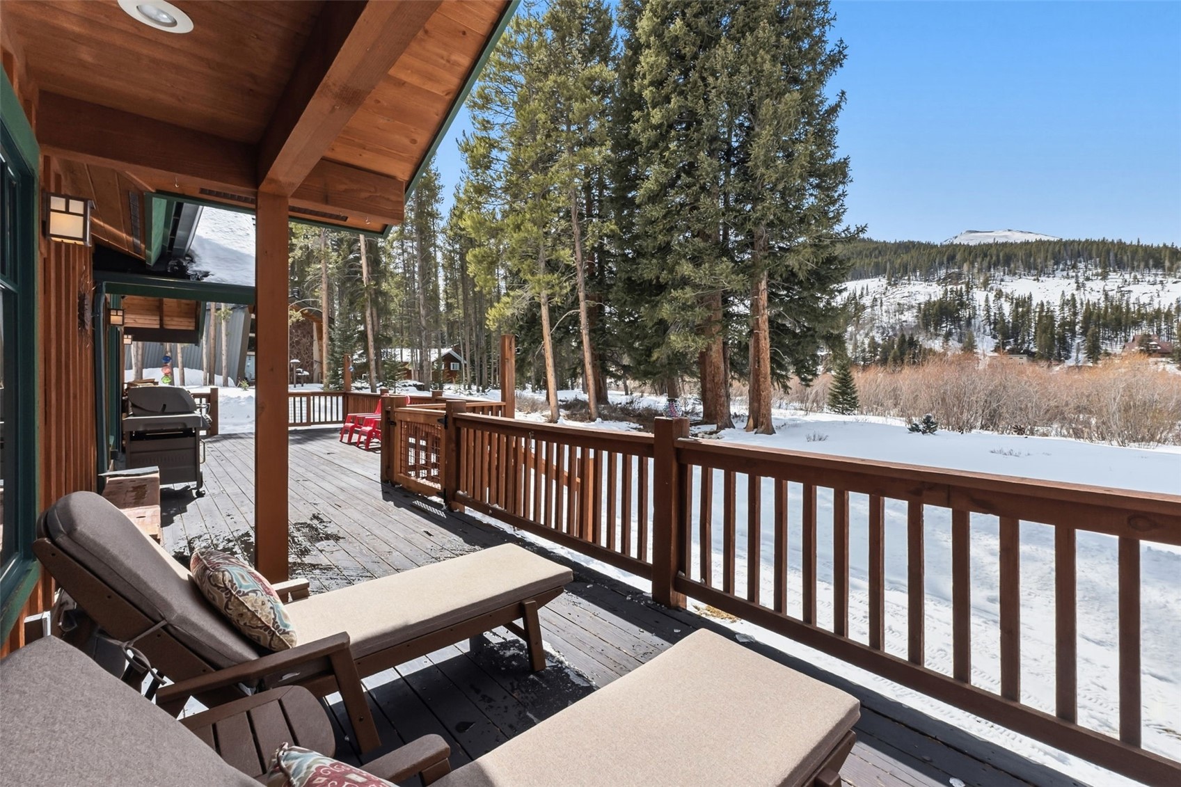 353 Blue River Road Blue River, CO 80424 - Photo 34 of 50 a view of a patio with a table and chairs