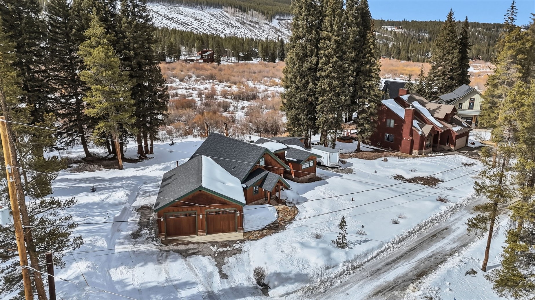 353 Blue River Road Blue River, CO 80424 - Photo 43 of 50 a aerial view of a house with a yard covered with snow
