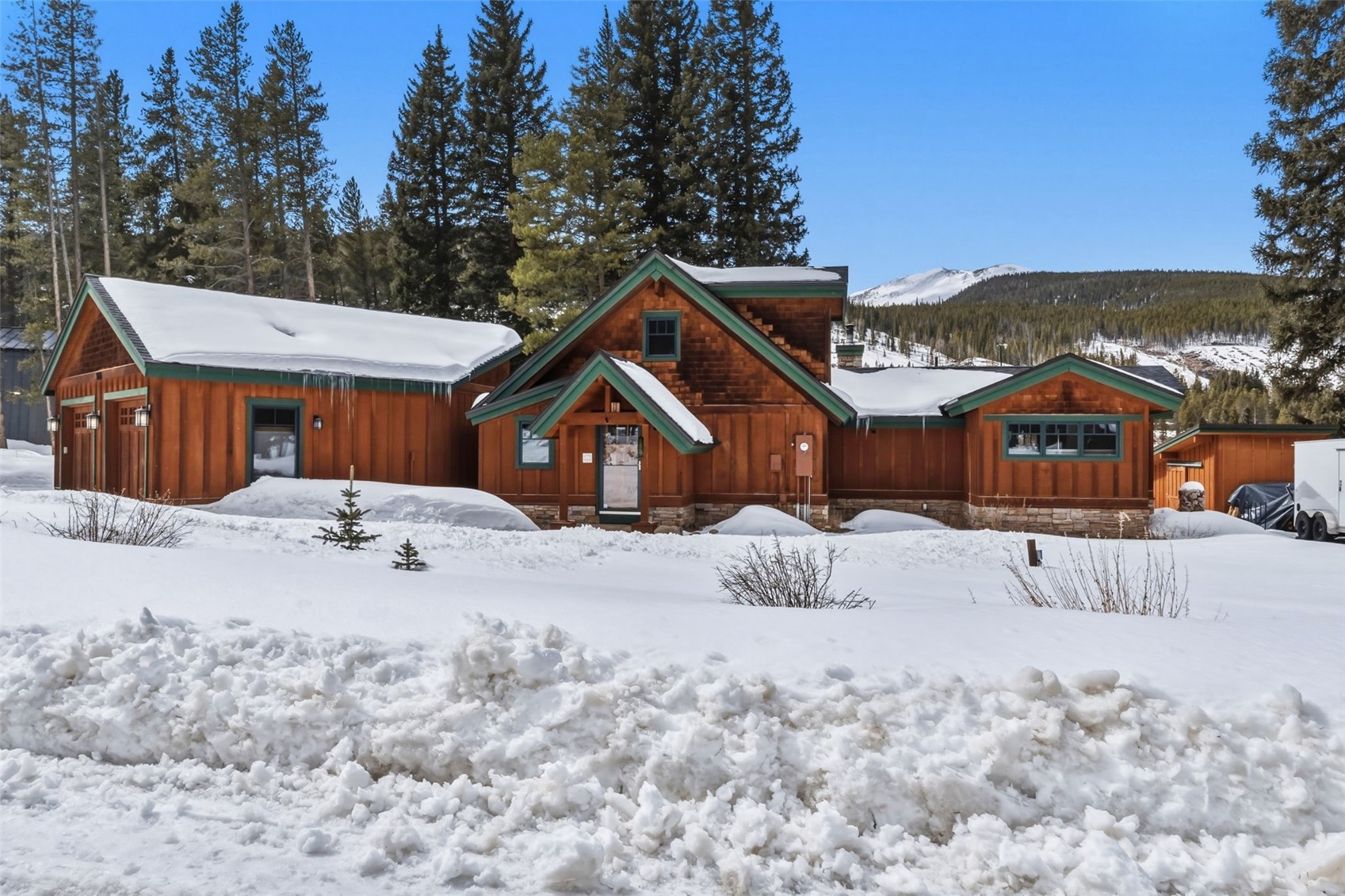 353 Blue River Road Blue River, CO 80424 - Photo 46 of 50 a front view of a house with a yard covered in snow