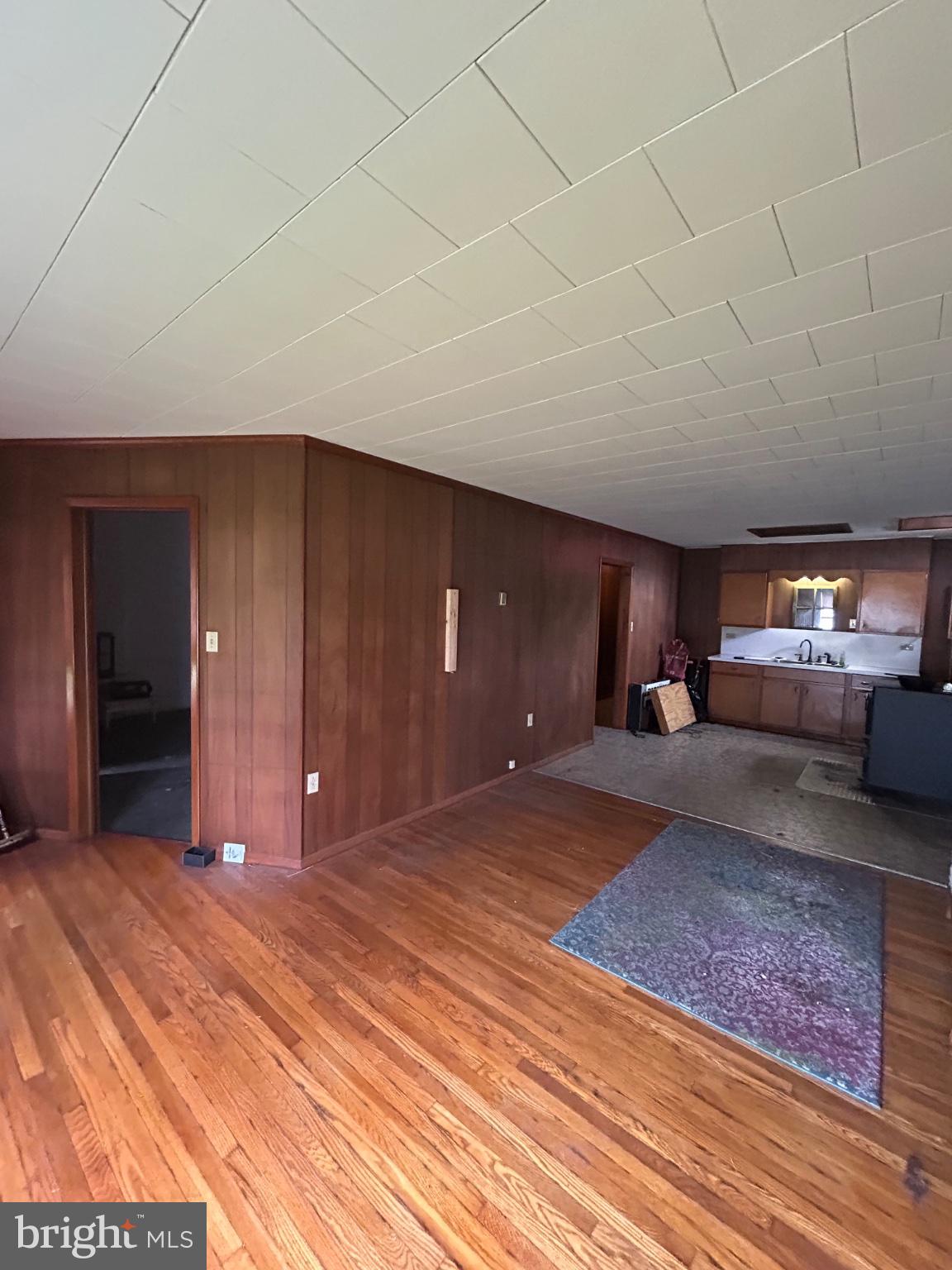 56 Maclay Street Milroy, PA 17063 - Photo 28 of 36 Spacious room with warm wood accents.