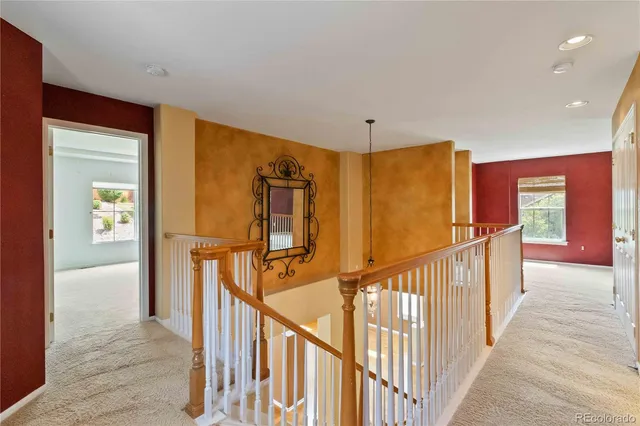 a view of hallway with stairs