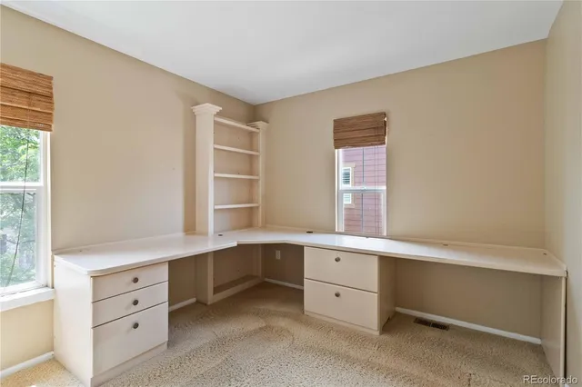 a room with cabinets and window