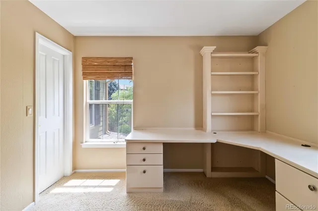 a room with a furniture and a window