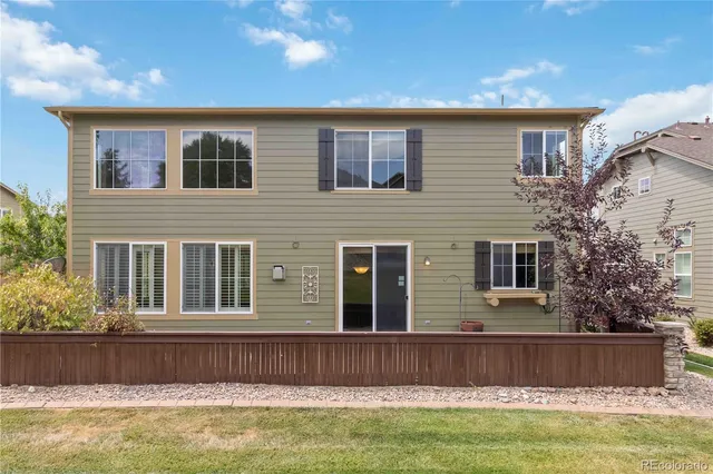a front view of house with yard