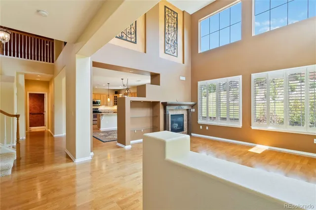 a view of livingroom with kitchen and furniture