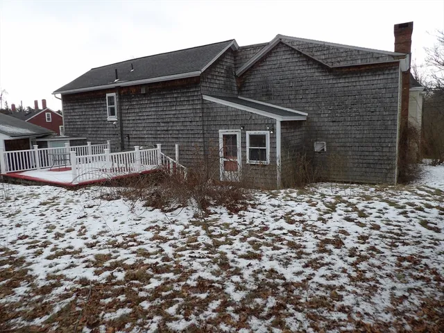 front view of a house with a small yard