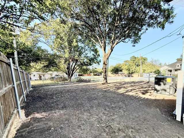 a view of road view and covered with trees
