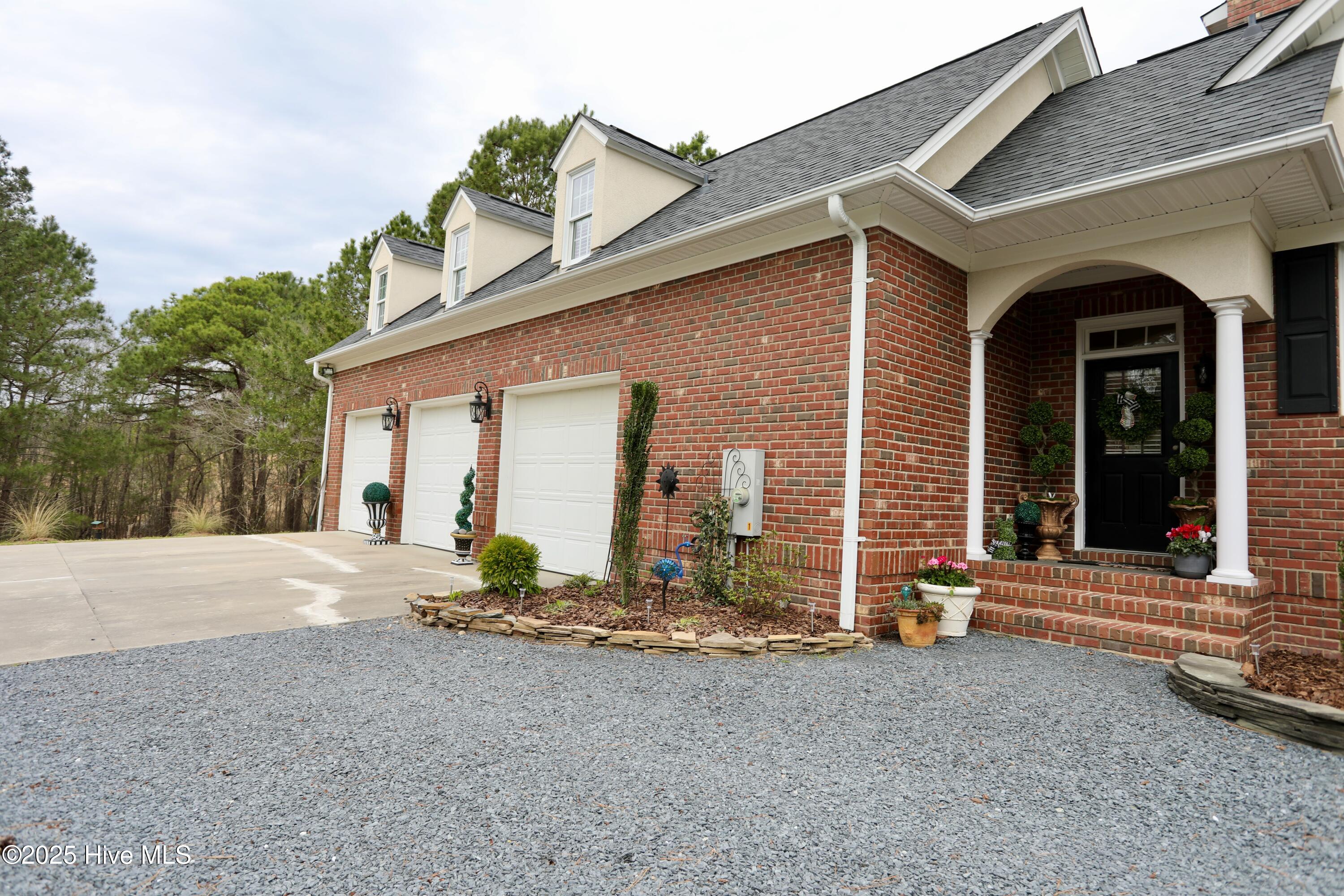 6680 Beulah Hill Church Road West End, NC 27376 - Photo 31 of 141 3 Car Garage and Side Entry Porch