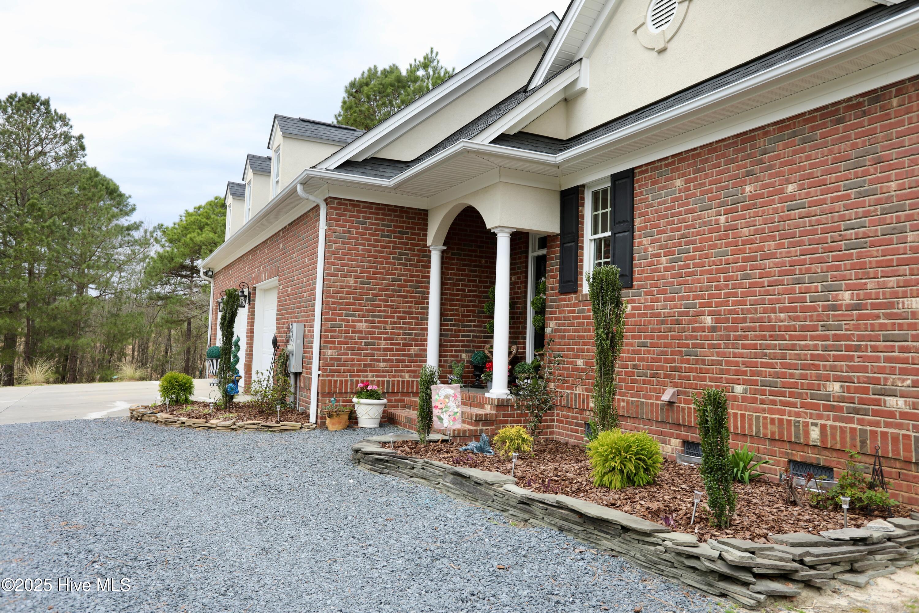 6680 Beulah Hill Church Road West End, NC 27376 - Photo 35 of 141 Side Entry Porch